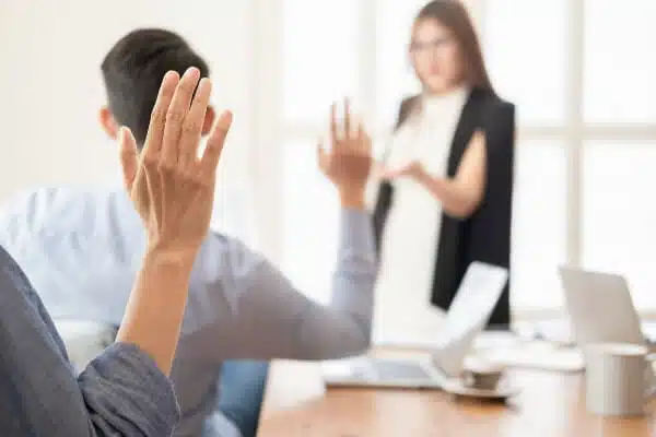 A class of students raising their hands for question time. Another interesting blog post idea.